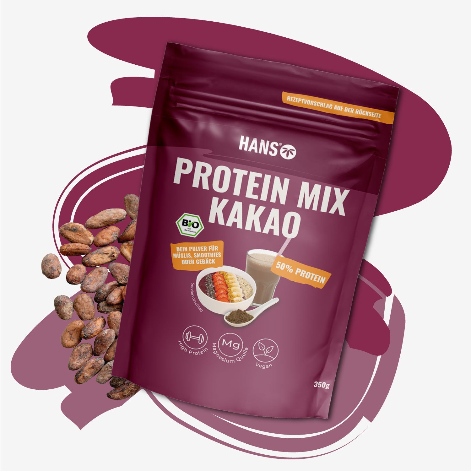 Fotografie produktu: Hans Protein Mix Kakao, balení s kakaovými boby, ukazuje smoothie a müsli s bobulemi a banány, v tmavě červené barvě a s označením bio.
