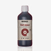 Biobizz bottle with dark liquid, showing Top-Max organic flowering stimulator with a red logo on a beige background and handmade seal