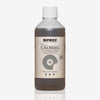Product photo of Biobizz Calmag, a brown liquid fertilizer in a transparent bottle with a beige label and grey logo, handmade since 1992
