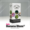Product photo by Dutch Passion: Auto Banana Blaze seed packet with Amsterdam motif, showing green, purple and brown cannabis flowers and seeds in a hexagonal pattern
