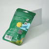 Bud Voyage product packaging shows a sunny lemon slice, rainbow and QR code on a green background with UV protection and recycling information
