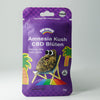 Bud Voyage packaging shows Amnesia Kush CBD flowers on a deck chair in front of palm trees with a rainbow carpet and a friendly face on the packaging
