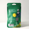 Bud Voyage product packaging with illustration of a slice of lemon in a sun, green hills and a rainbow on a green background, showing QR code and UV protection
