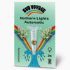 Bud Voyage illustration: Northern Lights Automatic cannabis seeds in test tube with rainbow and waves, three feminized seeds, pastel green background
