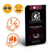 Sensi Seeds Research product artwork features feminized Purple Cookie Kush seeds in packaging with striking graphics, a retro style and a display of ten seeds in a purple and black color scheme.
