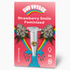 Bud Voyage graphic: feminized Strawberry Smile cannabis seeds in a test tube capsule against a pink background with rainbow and maritime elements