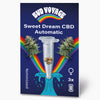 Bud Voyage graphic: Sweet Dream CBD Automatic seeds in a test tube, surrounded by rainbow and nautical motifs, showing three feminized seeds and bright green cannabis flowers
