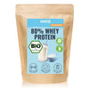 Hans brand 80% Whey Protein product package showing a glass of protein shake scoop of powder and various certifications including Bio and Grass Fed symbols in light blue and brown packaging
